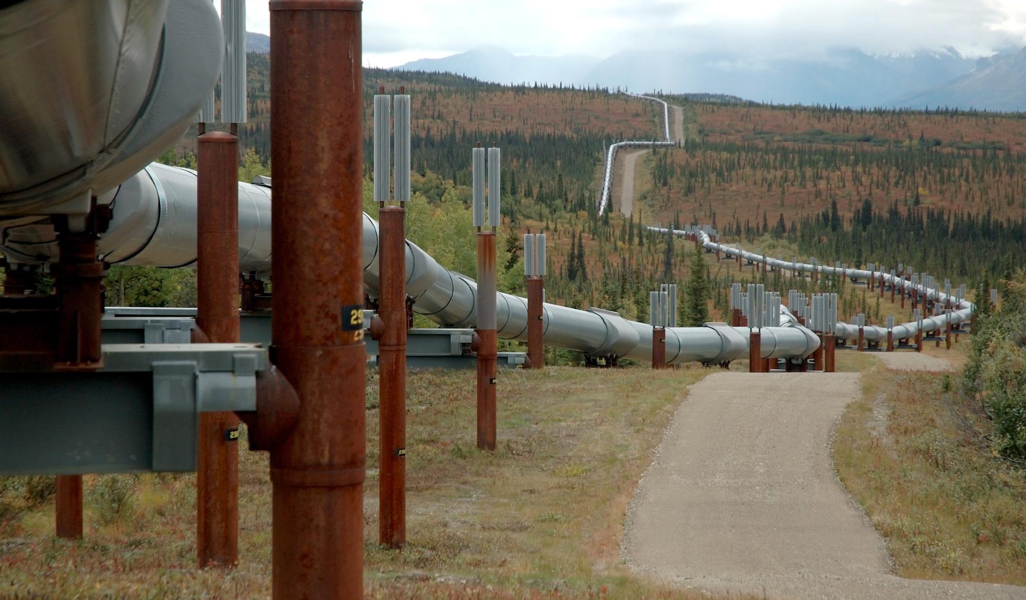 Above-ground pipeline running through a valley